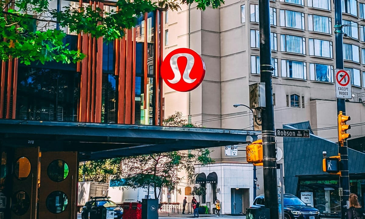 lululemon storefront exterior with branding signage, representing governance and leadership changes impacting LULU stock.