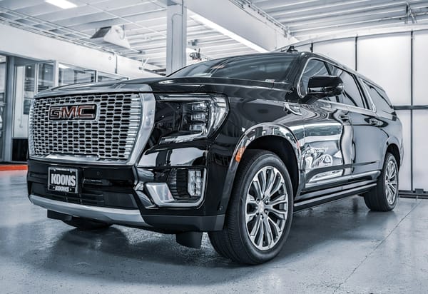 General Motors vehicles displayed at a U.S. dealership reflecting the company’s core truck and crossover lineup.