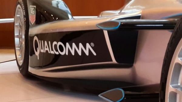 Qualcomm booth at CES 2026 showcasing Snapdragon automotive, PC, and robotics platforms.