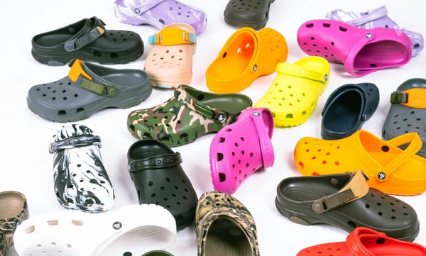 Crocs footwear display, representing CROX stock earnings and market reaction.